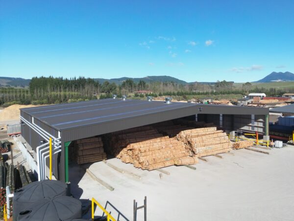 Aerial view of the PermaPine Dry Shed with posts stacked outside